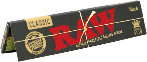 Discover RAW Black King Size Slim Rolling Papers, the epitome of unadulterated smoking pleasure. Elevate your sessions with 32 leaves of ultra-thin, additive-free, and 100% vegan goodness. Enjoy a clean, natural taste with the exclusive cross pattern watermark for an even burn. Experience true purity at Vape Bazaar! 