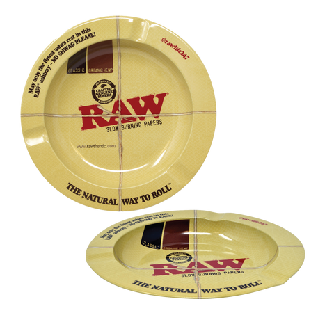 Elevate your smoking experience with the RAW Magnetic Ashtray. Designed for convenience and cleanliness, this ashtray is a testament to RAW's commitment to quality. Let only the finest ashes rest in this ashtray. NO SCHWAG PLEASE!  Order now from Vape Bazaar, your #1 Online Vape & Smoke Shop.